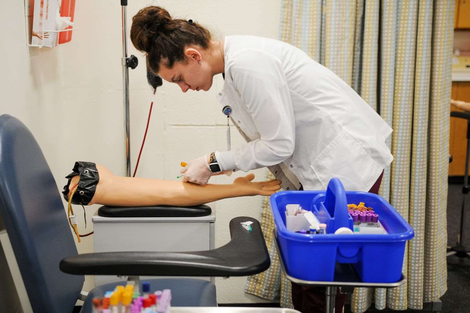 Allied Health student learning to draw blood
